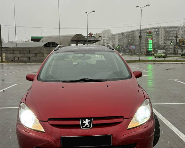 Красный Пежо 307, объемом двигателя 2 л и пробегом 253 тыс. км за 3400 $, фото 1 на Automoto.ua