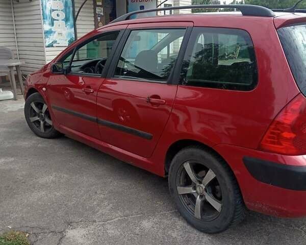 Красный Пежо 307, объемом двигателя 2 л и пробегом 380 тыс. км за 3500 $, фото 1 на Automoto.ua