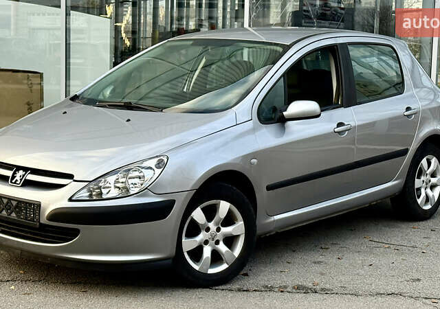 Серый Пежо 307, объемом двигателя 1.6 л и пробегом 232 тыс. км за 3999 $, фото 1 на Automoto.ua