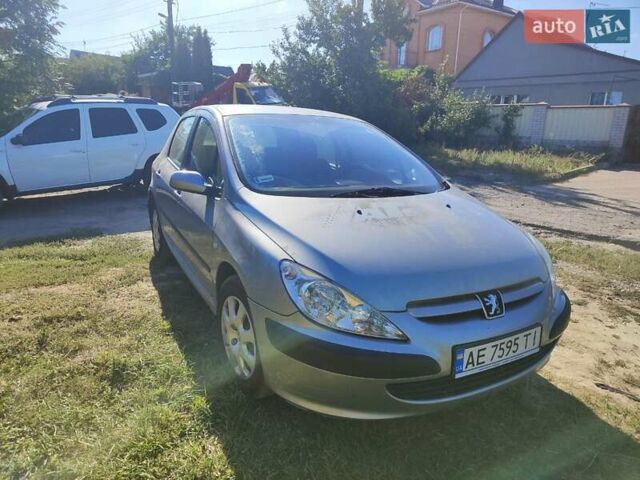 Серый Пежо 307, объемом двигателя 1.36 л и пробегом 213 тыс. км за 2600 $, фото 1 на Automoto.ua