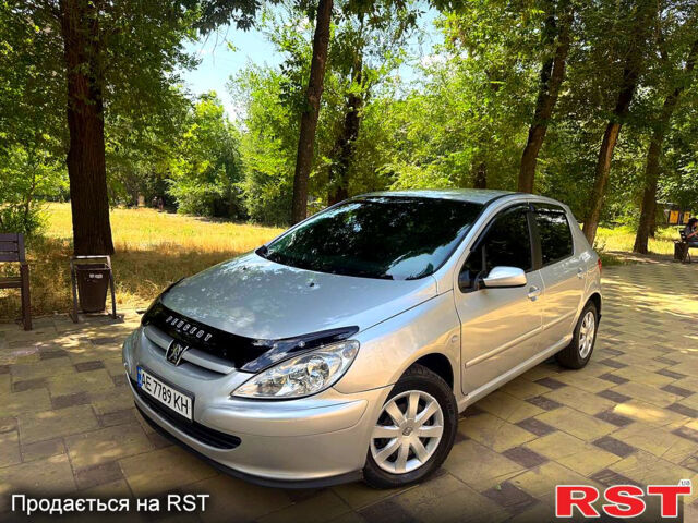 Серый Пежо 307, объемом двигателя 1.4 л и пробегом 250 тыс. км за 3000 $, фото 1 на Automoto.ua