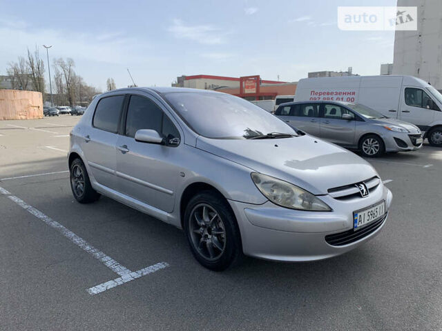 Серый Пежо 307, объемом двигателя 2 л и пробегом 309 тыс. км за 3700 $, фото 1 на Automoto.ua