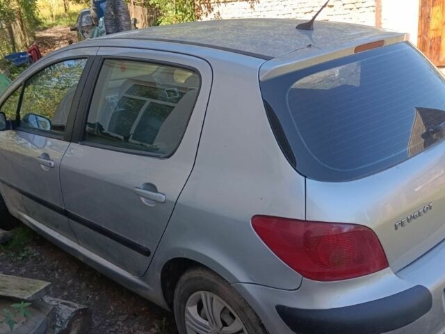 Серый Пежо 307, объемом двигателя 2 л и пробегом 200 тыс. км за 2000 $, фото 1 на Automoto.ua