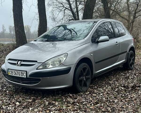 Серый Пежо 307, объемом двигателя 1.4 л и пробегом 312 тыс. км за 2300 $, фото 1 на Automoto.ua