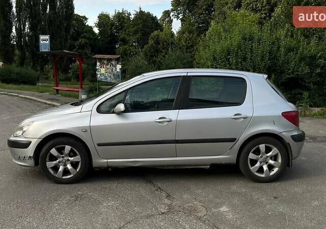 Серый Пежо 307, объемом двигателя 1.59 л и пробегом 407 тыс. км за 2000 $, фото 1 на Automoto.ua