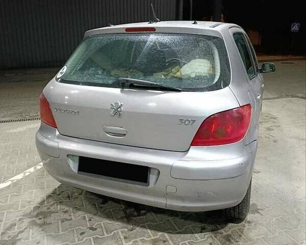 Серый Пежо 307, объемом двигателя 2 л и пробегом 350 тыс. км за 3300 $, фото 1 на Automoto.ua