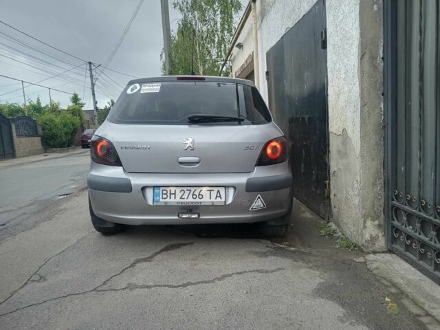 Серый Пежо 307, объемом двигателя 1.6 л и пробегом 375 тыс. км за 3500 $, фото 1 на Automoto.ua