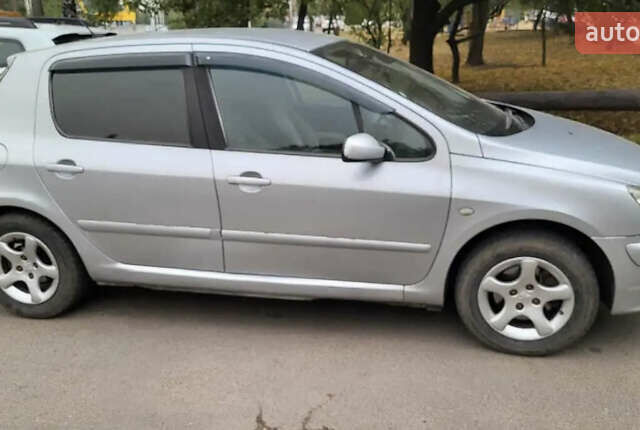 Серый Пежо 307, объемом двигателя 1.59 л и пробегом 288 тыс. км за 4000 $, фото 1 на Automoto.ua