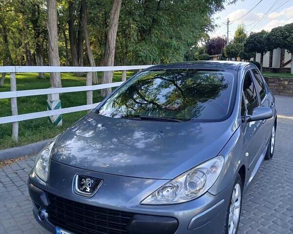 Серый Пежо 307, объемом двигателя 2 л и пробегом 193 тыс. км за 4500 $, фото 1 на Automoto.ua