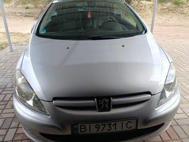 Серый Пежо 307, объемом двигателя 2 л и пробегом 236 тыс. км за 5500 $, фото 1 на Automoto.ua