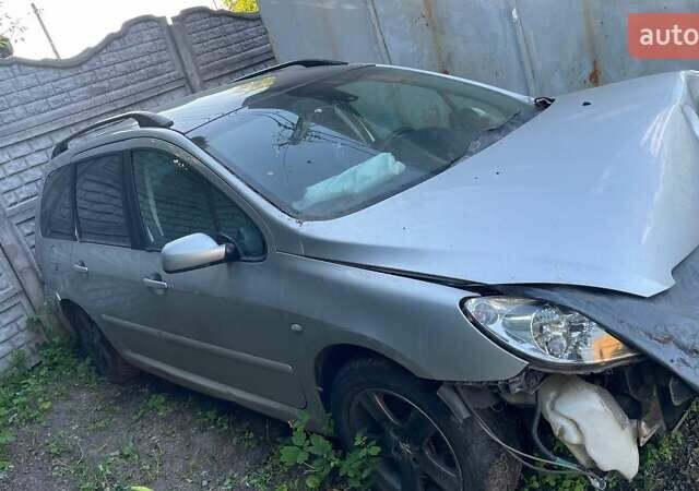 Серый Пежо 307, объемом двигателя 2 л и пробегом 370 тыс. км за 1650 $, фото 1 на Automoto.ua