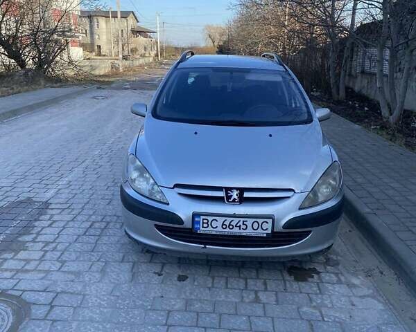 Серый Пежо 307, объемом двигателя 1.9 л и пробегом 385 тыс. км за 4200 $, фото 1 на Automoto.ua