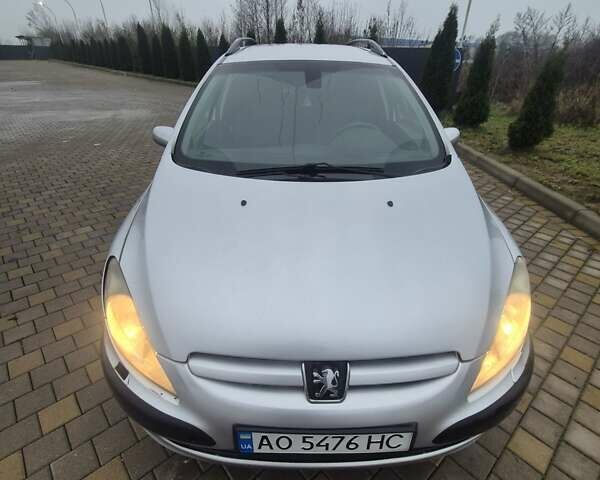 Серый Пежо 307, объемом двигателя 2 л и пробегом 241 тыс. км за 2476 $, фото 1 на Automoto.ua