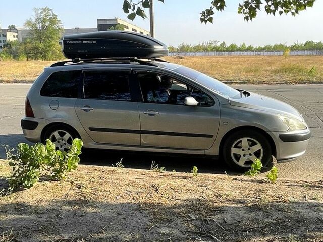 Серый Пежо 307, объемом двигателя 1.6 л и пробегом 192 тыс. км за 4100 $, фото 1 на Automoto.ua