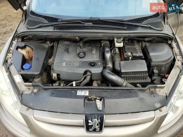 Серый Пежо 307, объемом двигателя 2 л и пробегом 261 тыс. км за 4500 $, фото 1 на Automoto.ua
