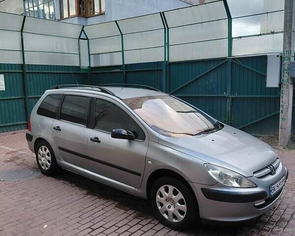 Серый Пежо 307, объемом двигателя 1.4 л и пробегом 400 тыс. км за 3500 $, фото 1 на Automoto.ua