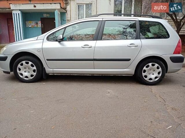 Серый Пежо 307, объемом двигателя 1.4 л и пробегом 171 тыс. км за 3400 $, фото 1 на Automoto.ua
