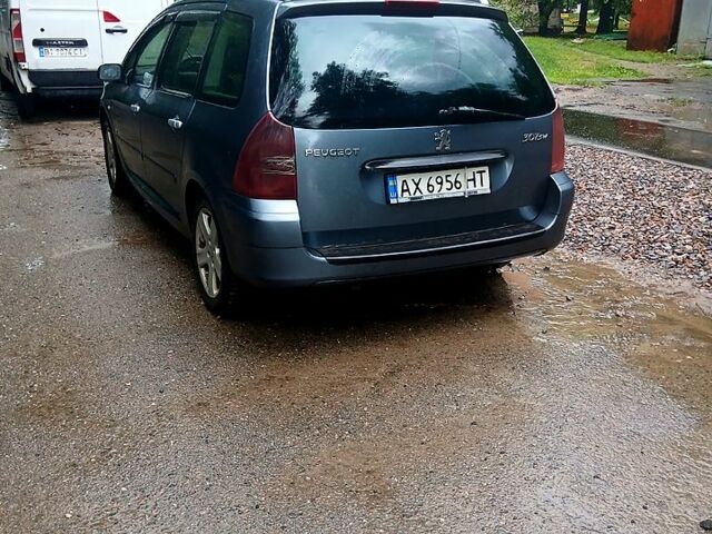 Серый Пежо 307, объемом двигателя 1.6 л и пробегом 460 тыс. км за 3000 $, фото 1 на Automoto.ua
