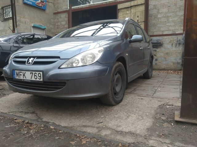 Серый Пежо 307, объемом двигателя 1.6 л и пробегом 302 тыс. км за 1600 $, фото 1 на Automoto.ua