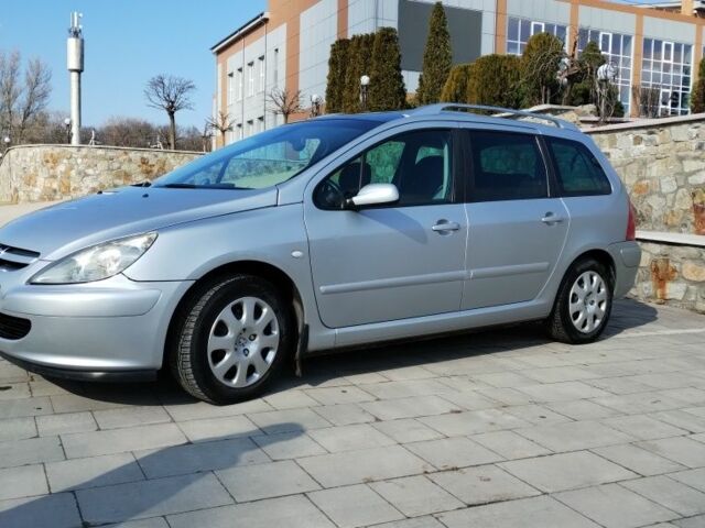 Серый Пежо 307, объемом двигателя 1.6 л и пробегом 243 тыс. км за 4400 $, фото 1 на Automoto.ua