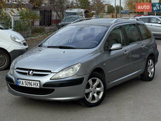 Серый Пежо 307, объемом двигателя 1.59 л и пробегом 227 тыс. км за 3650 $, фото 1 на Automoto.ua