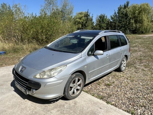 Серый Пежо 307, объемом двигателя 2 л и пробегом 230 тыс. км за 1301 $, фото 1 на Automoto.ua
