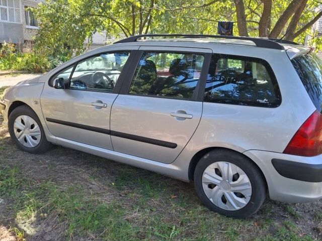 Серый Пежо 307, объемом двигателя 0 л и пробегом 235 тыс. км за 4000 $, фото 1 на Automoto.ua