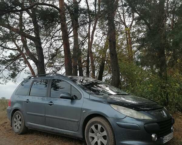 Серый Пежо 307, объемом двигателя 1.6 л и пробегом 196 тыс. км за 4930 $, фото 1 на Automoto.ua