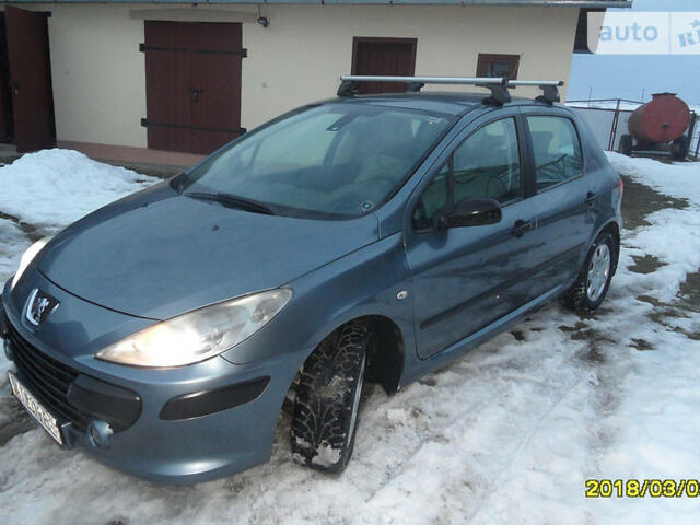 Сірий Пежо 307, об'ємом двигуна 1.4 л та пробігом 200 тис. км за 5150 $, фото 1 на Automoto.ua