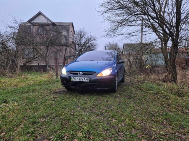 Синий Пежо 307, объемом двигателя 1.4 л и пробегом 286 тыс. км за 1950 $, фото 1 на Automoto.ua