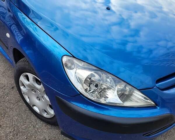 Синий Пежо 307, объемом двигателя 1.6 л и пробегом 141 тыс. км за 4500 $, фото 1 на Automoto.ua