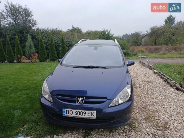 Синий Пежо 307, объемом двигателя 1.59 л и пробегом 200 тыс. км за 3800 $, фото 1 на Automoto.ua