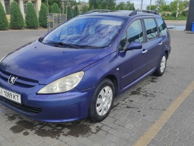 Синий Пежо 307, объемом двигателя 1.6 л и пробегом 306 тыс. км за 2700 $, фото 1 на Automoto.ua