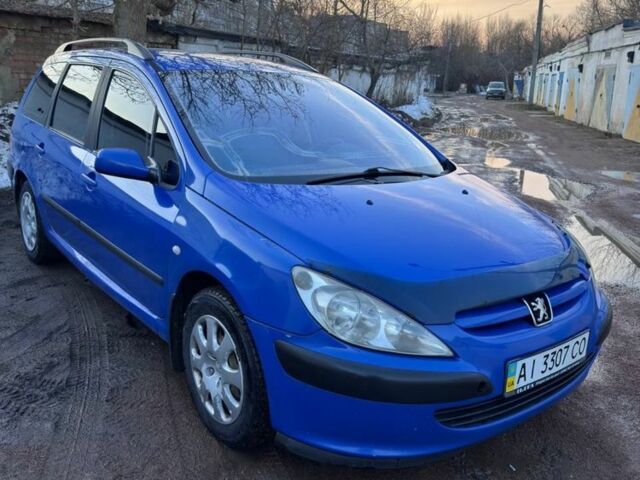 Синий Пежо 307, объемом двигателя 1.6 л и пробегом 400 тыс. км за 2900 $, фото 1 на Automoto.ua