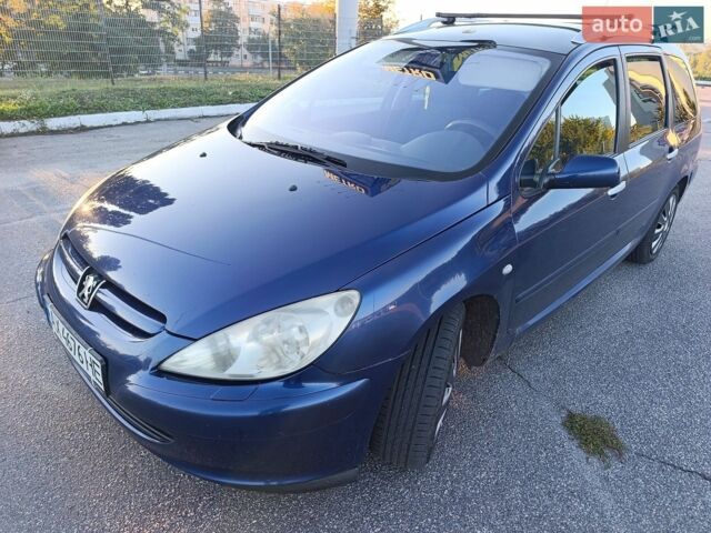 Синий Пежо 307, объемом двигателя 2 л и пробегом 297 тыс. км за 4500 $, фото 1 на Automoto.ua