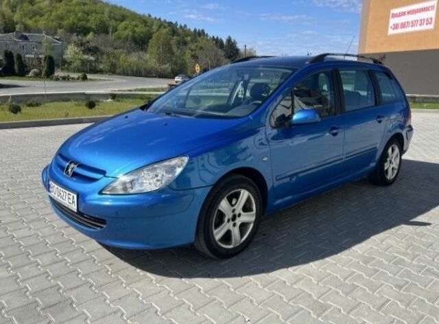 Синий Пежо 307, объемом двигателя 1.6 л и пробегом 359 тыс. км за 2950 $, фото 1 на Automoto.ua