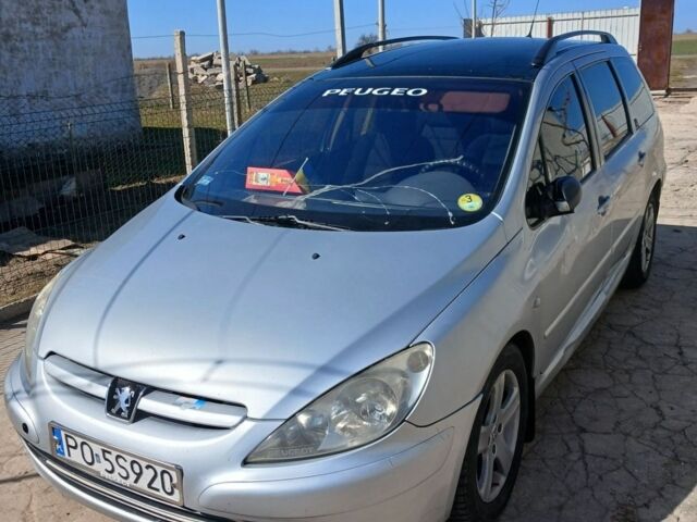 Синий Пежо 307, объемом двигателя 2.01 л и пробегом 394 тыс. км за 1700 $, фото 1 на Automoto.ua