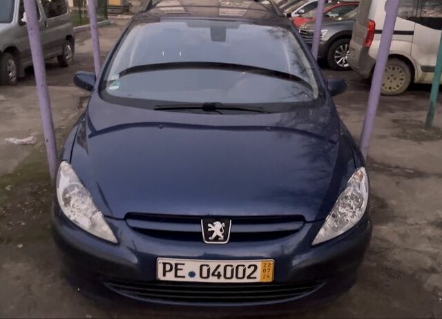 Синий Пежо 307, объемом двигателя 1.6 л и пробегом 250 тыс. км за 2500 $, фото 1 на Automoto.ua