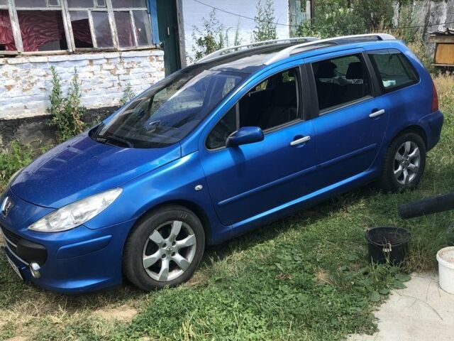 Синий Пежо 307, объемом двигателя 1.6 л и пробегом 286 тыс. км за 4500 $, фото 1 на Automoto.ua