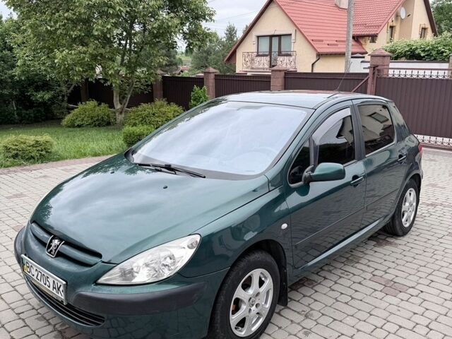 Зеленый Пежо 307, объемом двигателя 1.36 л и пробегом 245 тыс. км за 3000 $, фото 1 на Automoto.ua