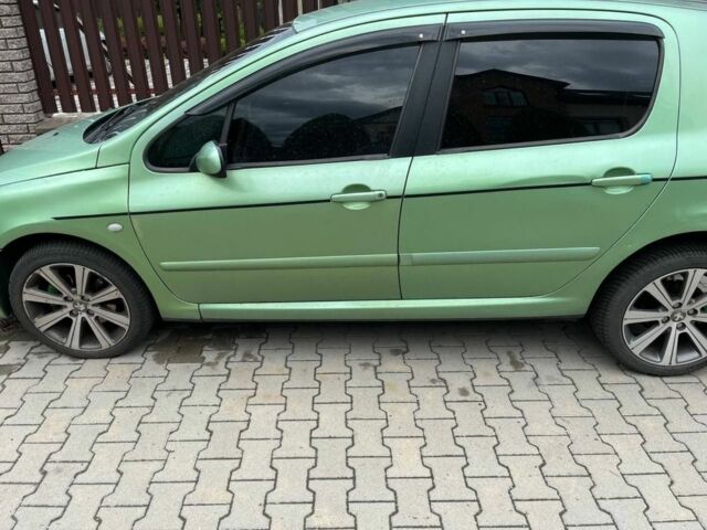 Зеленый Пежо 307, объемом двигателя 2 л и пробегом 230 тыс. км за 3800 $, фото 1 на Automoto.ua