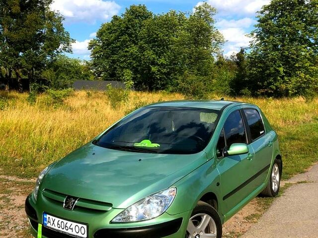 Зеленый Пежо 307, объемом двигателя 1.4 л и пробегом 240 тыс. км за 3650 $, фото 1 на Automoto.ua
