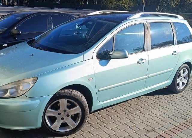 Зелений Пежо 307, об'ємом двигуна 2 л та пробігом 310 тис. км за 3700 $, фото 1 на Automoto.ua
