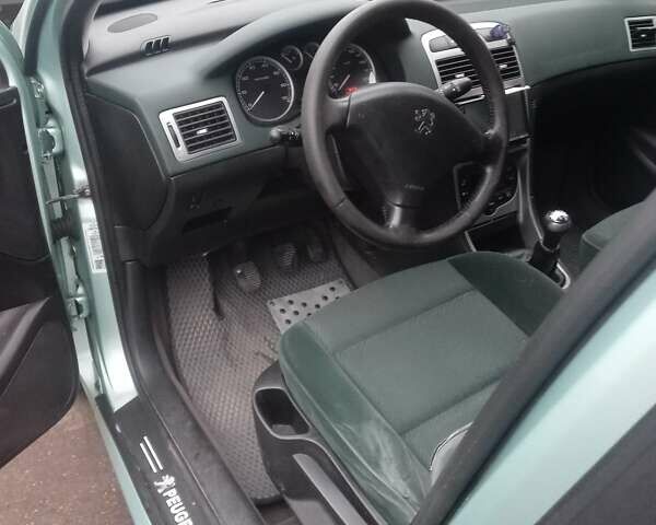 Зелений Пежо 307, об'ємом двигуна 1.59 л та пробігом 300 тис. км за 3799 $, фото 1 на Automoto.ua