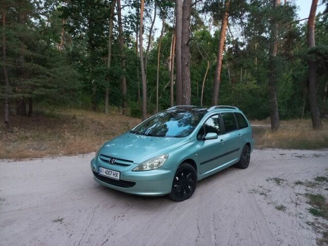 Зеленый Пежо 307, объемом двигателя 2 л и пробегом 452 тыс. км за 2149 $, фото 1 на Automoto.ua