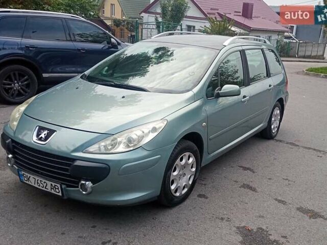 Зеленый Пежо 307, объемом двигателя 1.59 л и пробегом 282 тыс. км за 3900 $, фото 1 на Automoto.ua