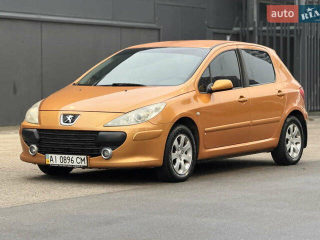 Оранжевый Пежо 307, объемом двигателя 2 л и пробегом 206 тыс. км за 3990 $, фото 1 на Automoto.ua