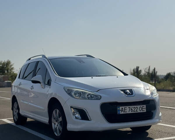 Белый Пежо 308, объемом двигателя 1.6 л и пробегом 183 тыс. км за 8000 $, фото 1 на Automoto.ua