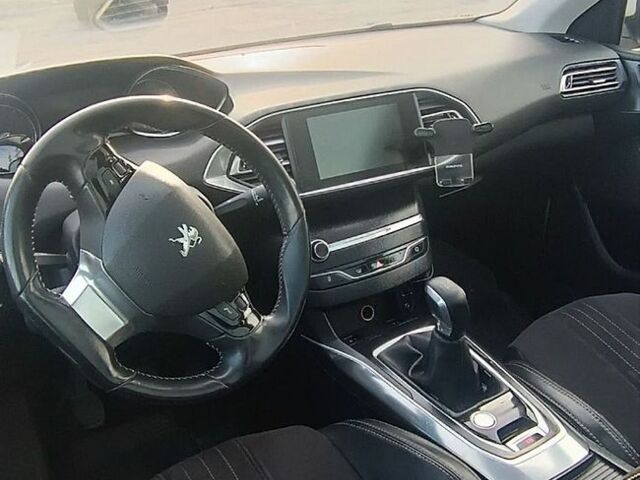 Белый Пежо 308, объемом двигателя 1.59 л и пробегом 162 тыс. км за 9400 $, фото 1 на Automoto.ua