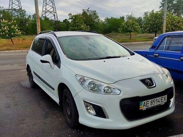 Белый Пежо 308, объемом двигателя 1.6 л и пробегом 185 тыс. км за 7100 $, фото 1 на Automoto.ua